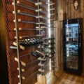 XSTONE Wall - 036 - Wallcovering Rust Diamond on a wall behind a rack of wine bottles