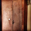 XSTONE Wall - 038 - Veneer Rust Diamond on a door