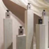 1086 XSTONE mineral veneer roll Travertine Light beige popup stand perfume shop